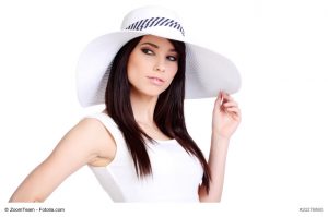 Summer girl in white cap